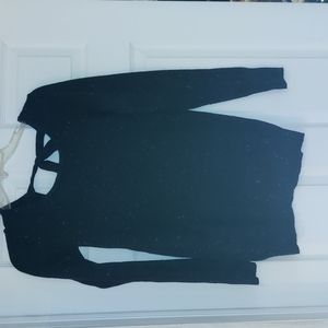 Peek a boo tie back knit sweater. Speckled design